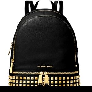 Gorgeous Brand New Micheal Kors Black Pebbled Leather Backpack.